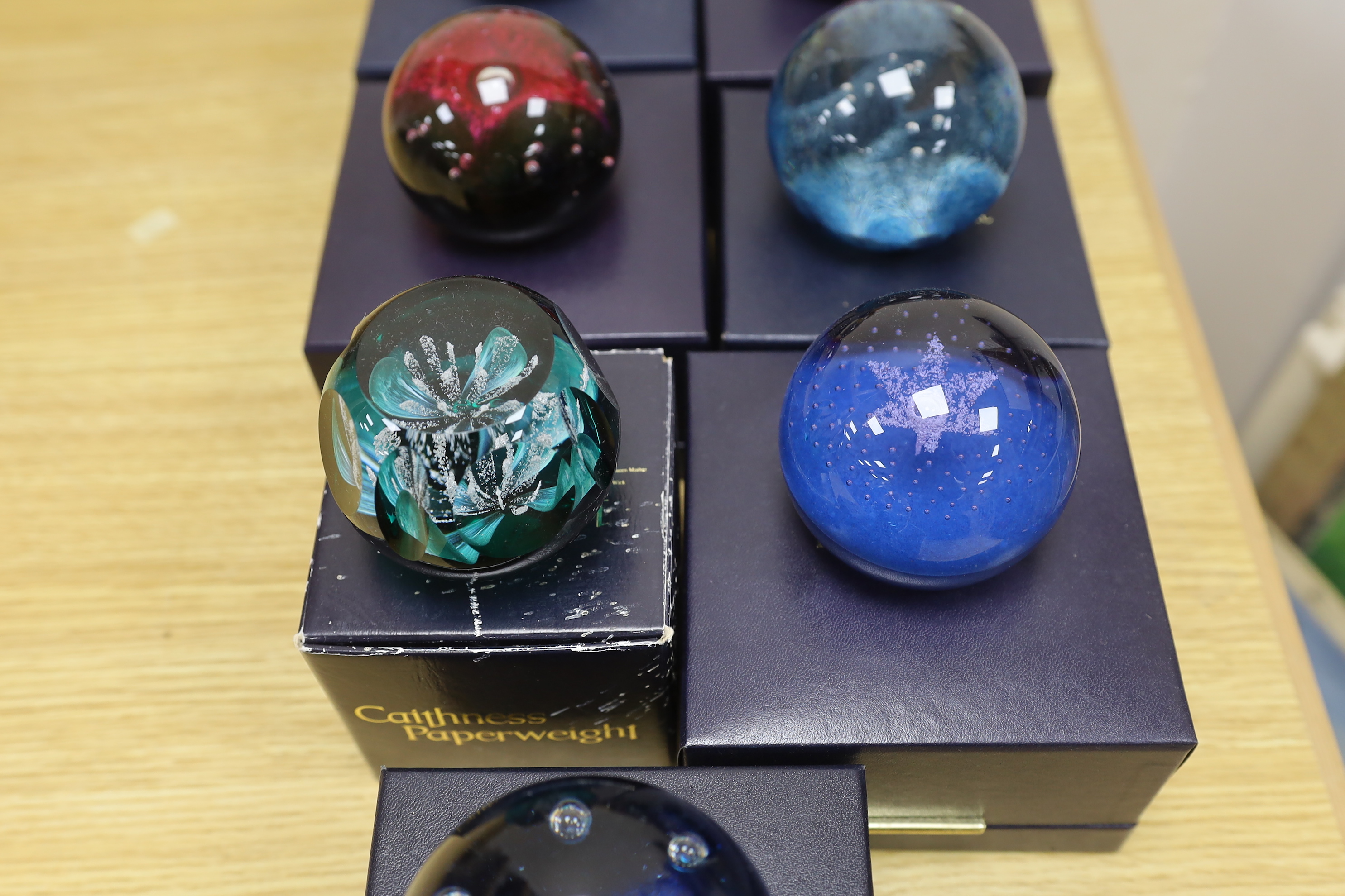 Nine Caithness paperweights, boxed, some limited edition